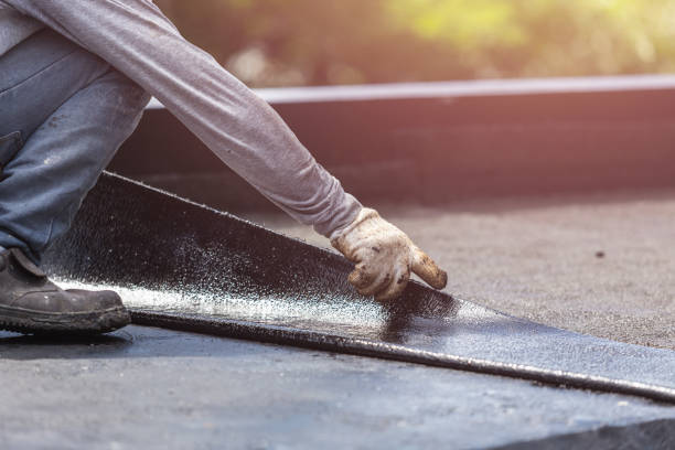 Professional Waterproofing technician working in Hilbert, WI
